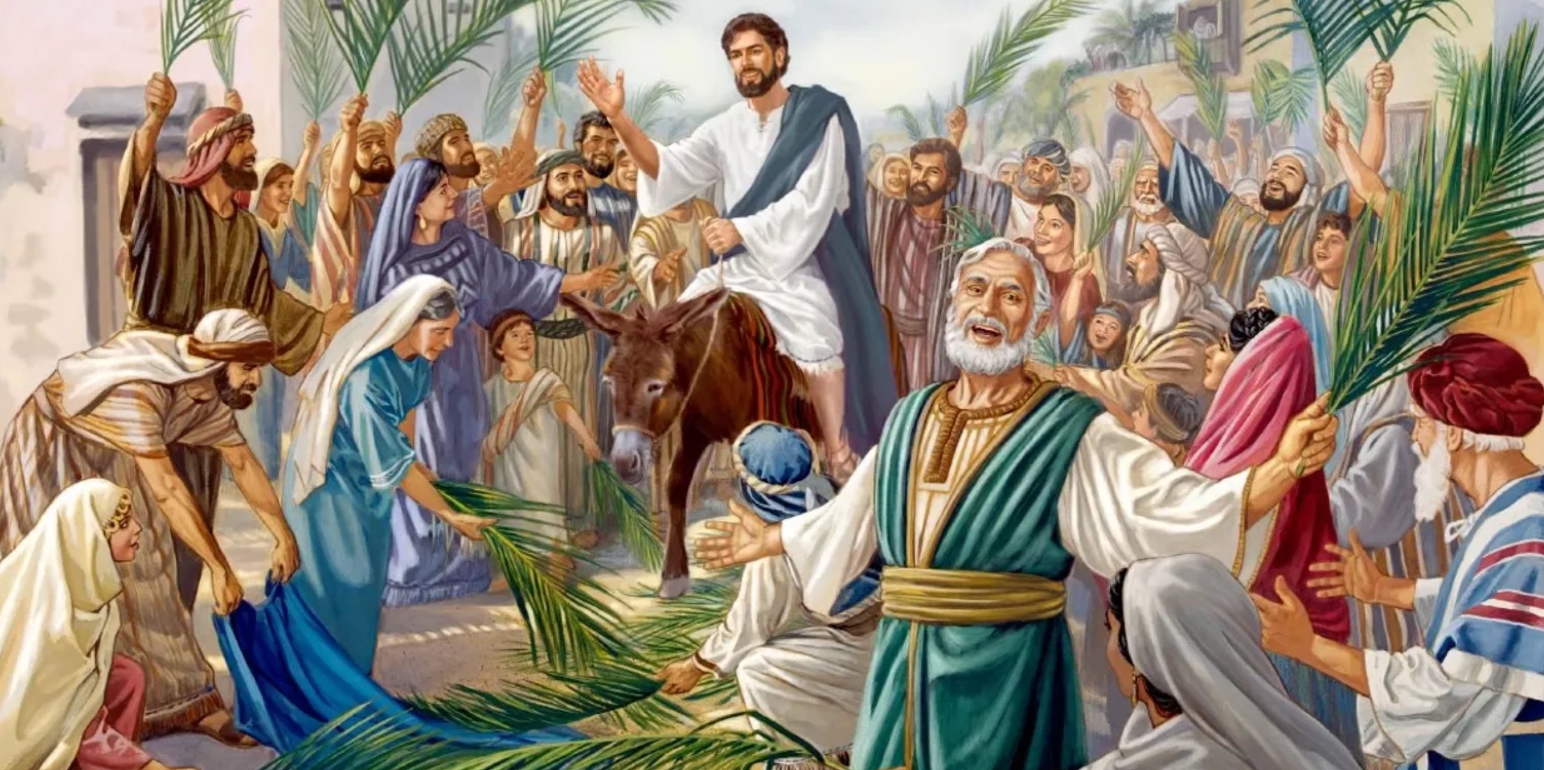 Jesus entering Jerusalem as people welcome Him with palm branches