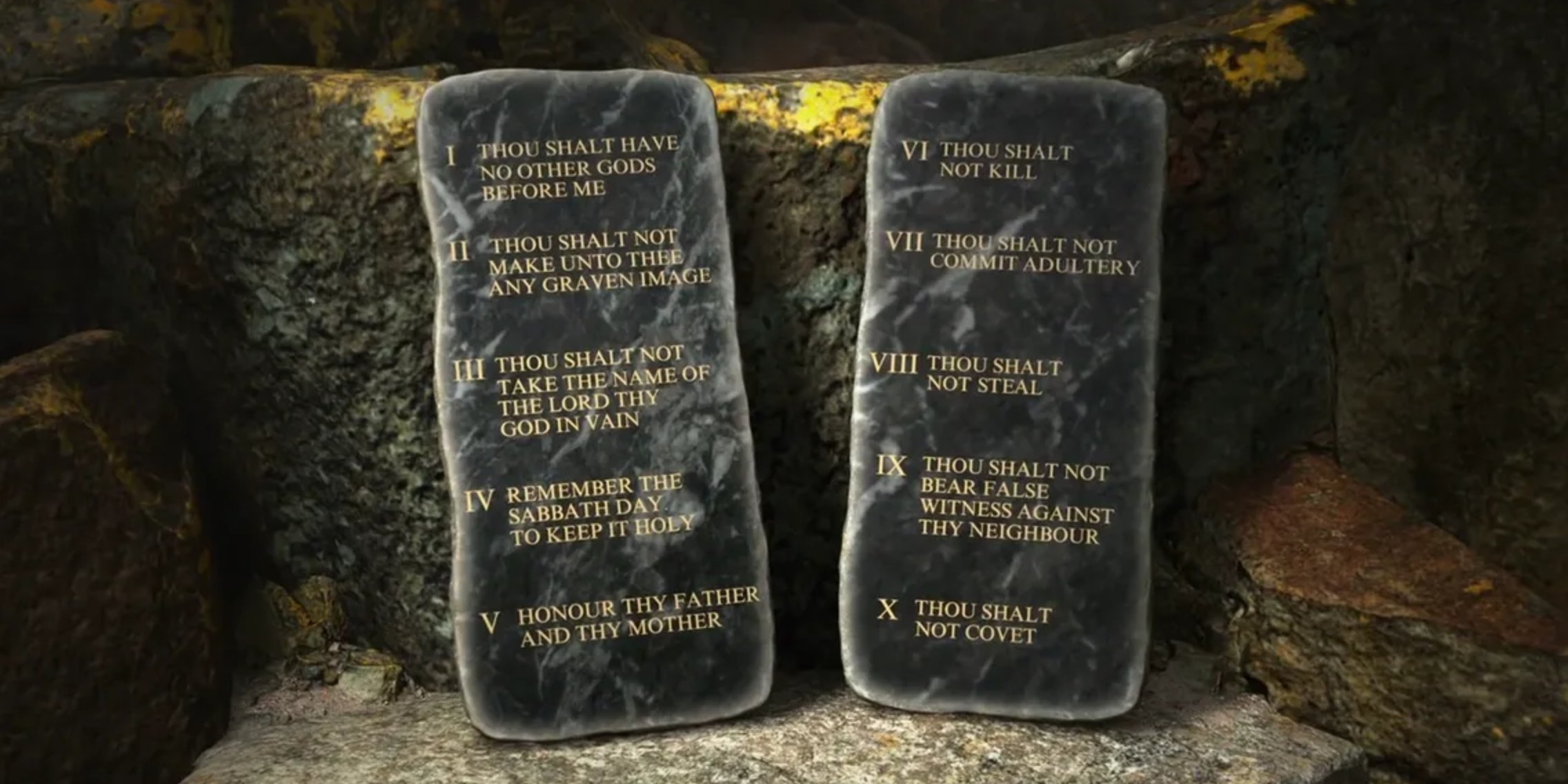 The Ten Commandments inscribed on two dark stone tablets